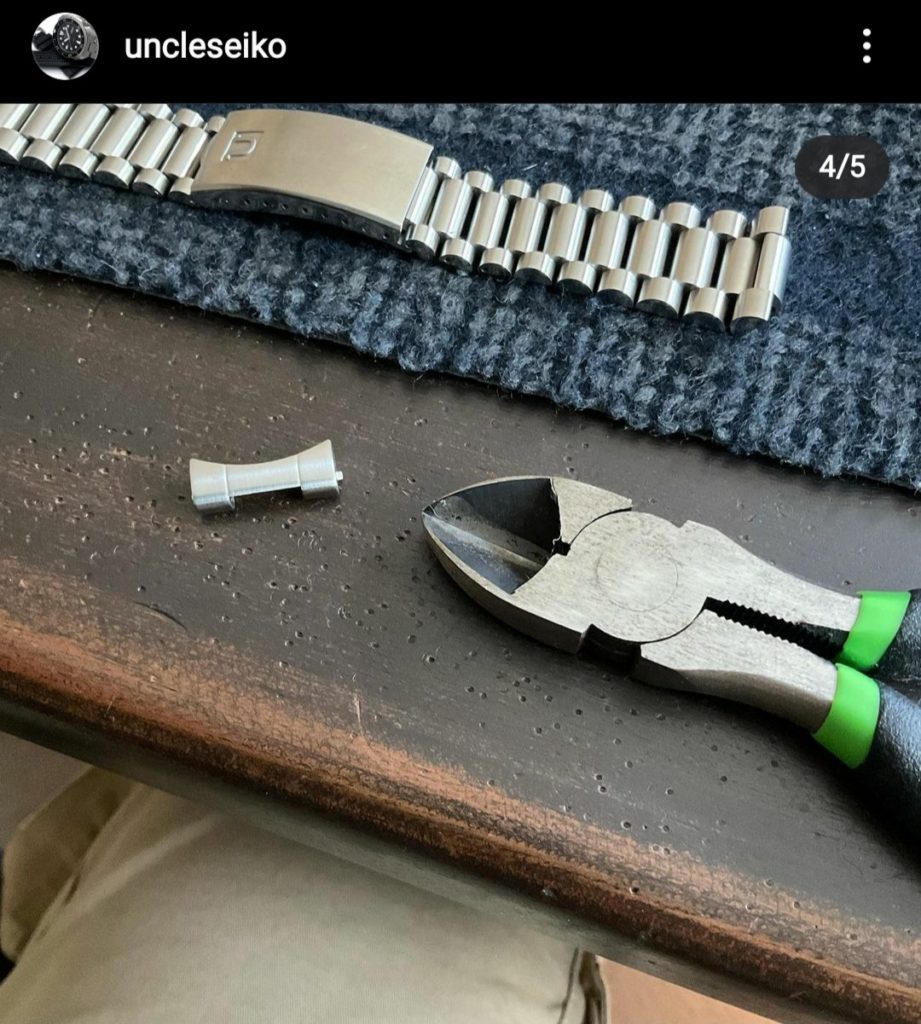 Uncle Seiko Image: using wire cutters to remove end-link tabs